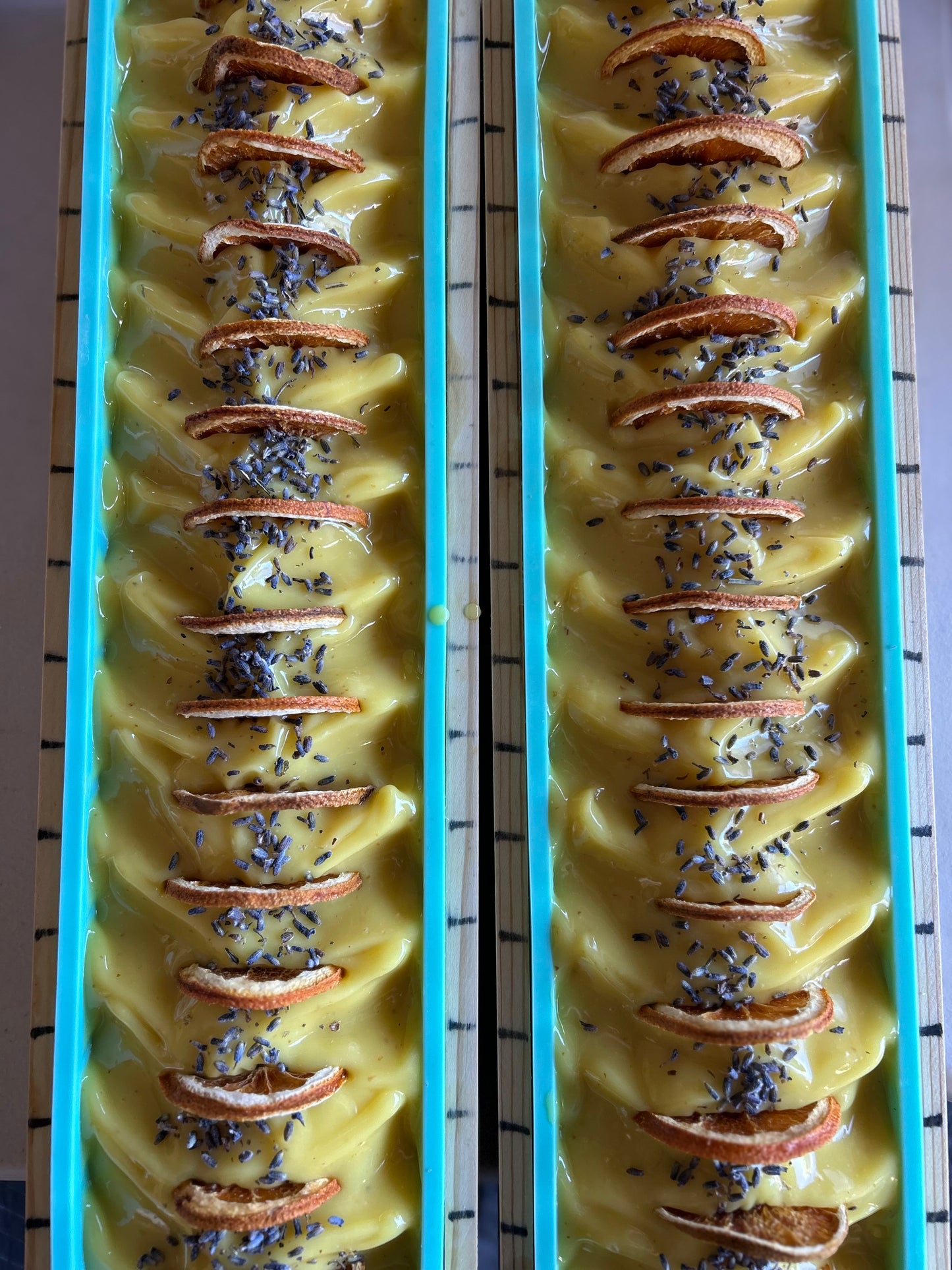 ORANGE LAVENDER goat's milk soap, kaolin clay, orange peel, orange, lavender and cedarwood essential oil, topped with orange wedge and lavender buds, Kendrick Homestead