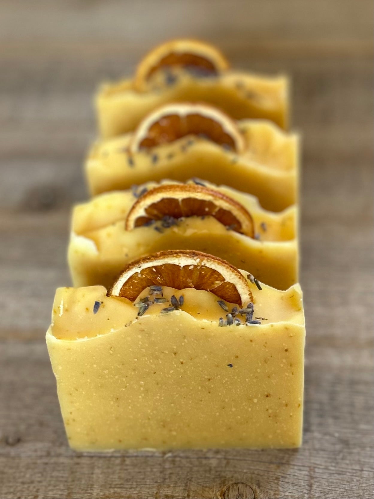 Jump start your morning routine with the invigorating smell of Orange Lavender soap. Made with nourishing goat's milk, cocoa butter, shea butter, avocado oil, kaolin clay and orange peel to lightly exfoliate, refresh and soften the skin. Kendrick Homestead