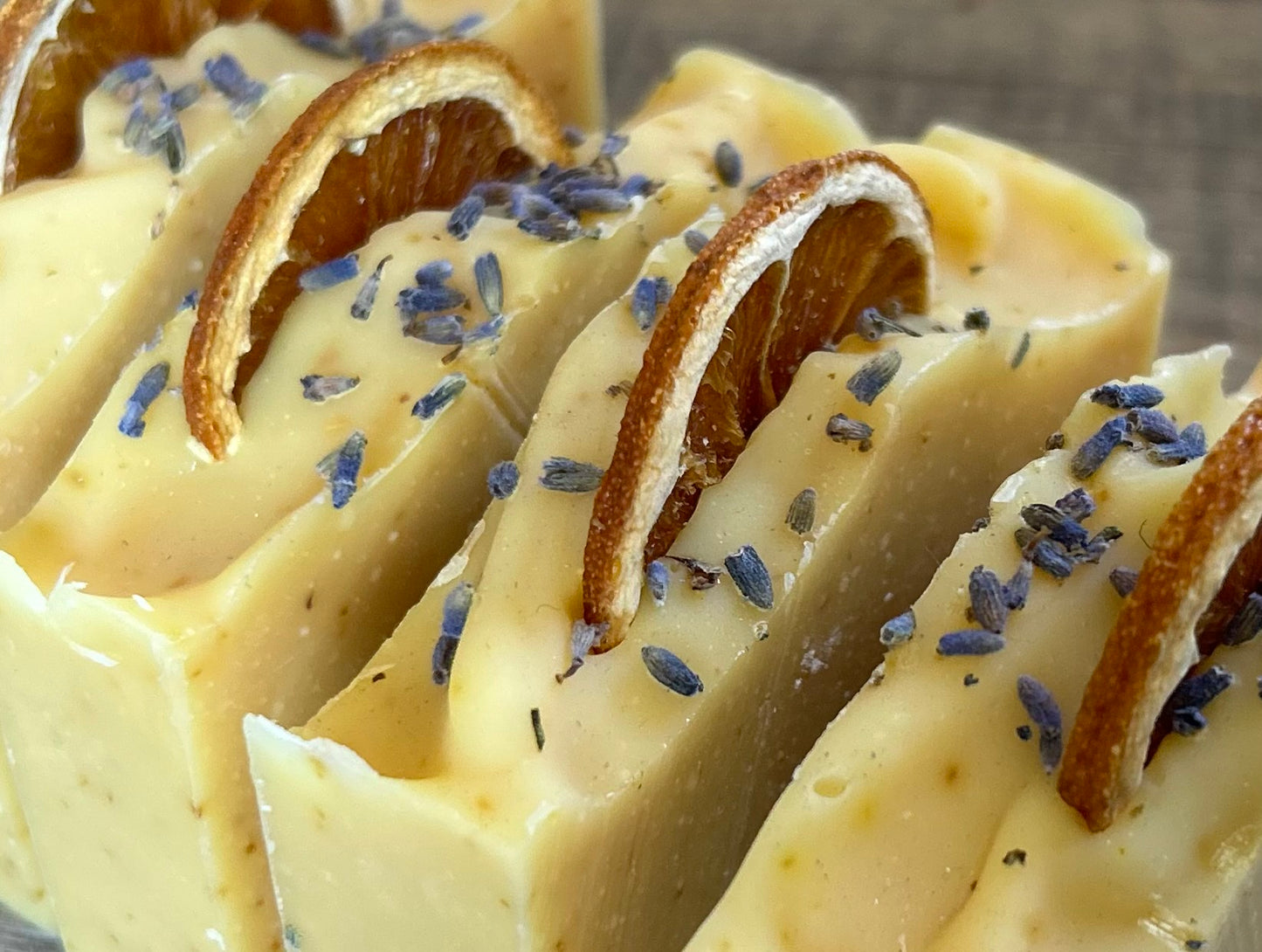 Jump start your morning routine with the invigorating smell of Orange Lavender soap. Made with nourishing goat's milk, cocoa butter, shea butter, avocado oil, kaolin clay and orange peel to lightly exfoliate, refresh and soften the skin. Kendrick Homestead