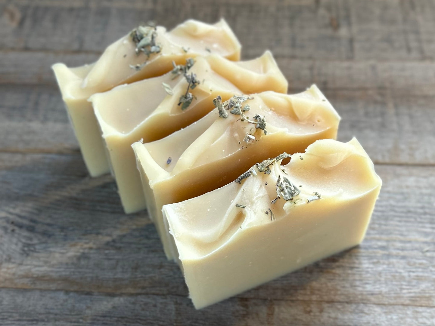 Let the worries of the day slide away with the help of this relaxing herbal blend of white sage, lavender and cedarwood. Lavender & White Sage soap is made with nourishing goat's milk, olive oil, coconut oil, cocoa butter, shea butter, sweet almond oil, castor oil, kaolin clay and dried white sage. Kendrick Homestead