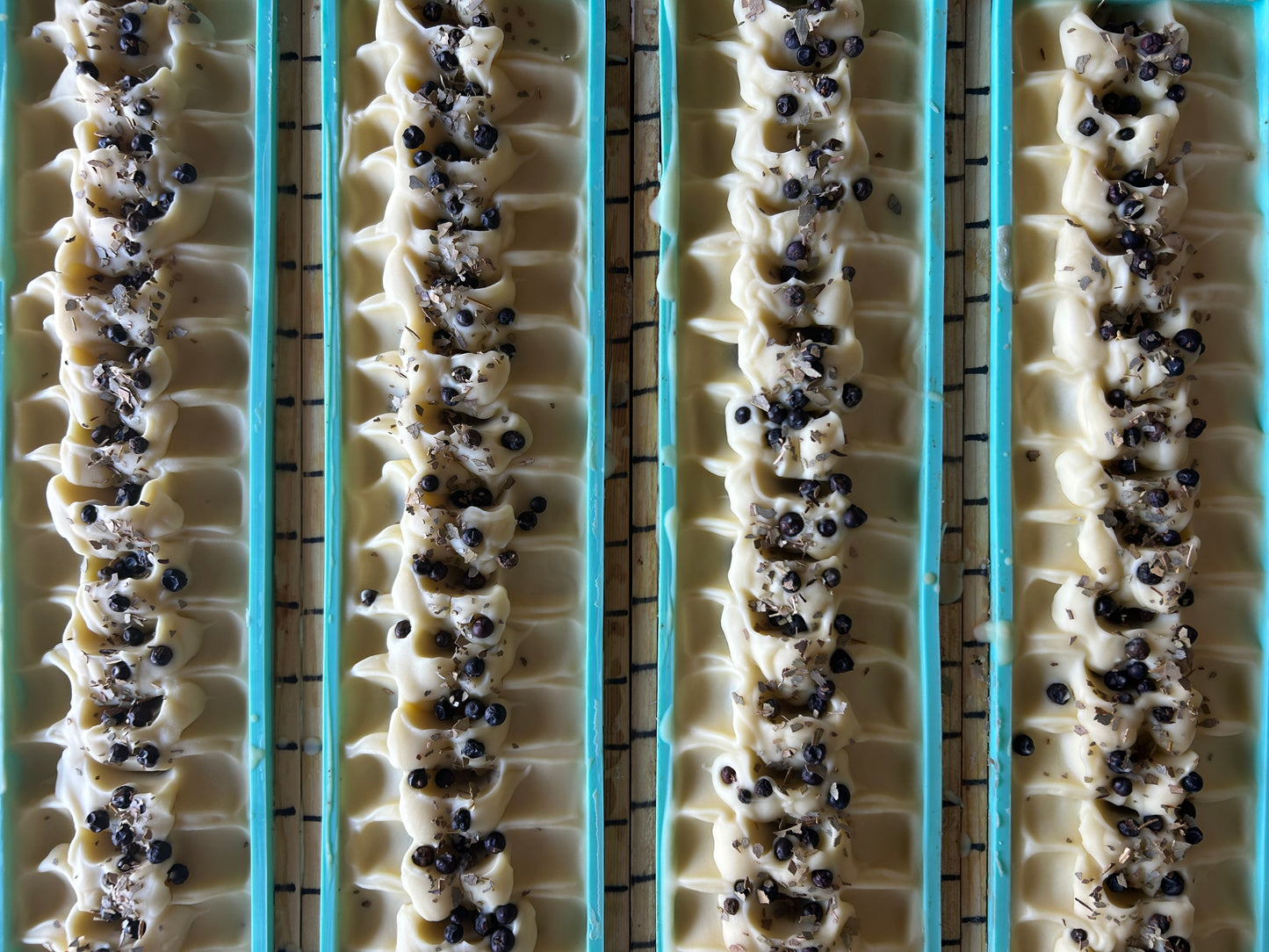 Into The Woods soap is made with a blend of peppermint, spearmint and rosemary essential oil for a refreshing, cooling effect on the skin. This blend will ease your mind and clear your senses. Made with nourishing goat's milk, cocoa butter, avocado oil, kaolin clay, french green clay and ground juniper berries for light exfoliation. Kendrick Homestead