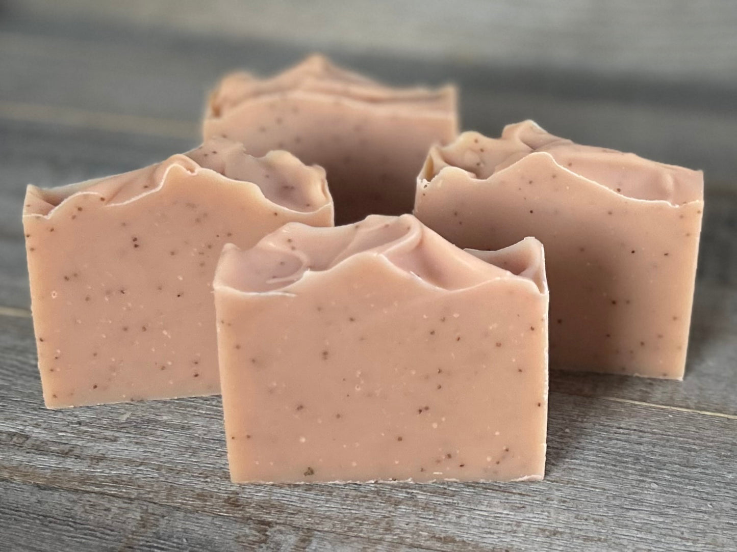 Strawberry Blossom Soap is a sweet citrus blend of neroli and bergamot essential oils. This soap is made with soothing coconut milk, olive oil, coconut oil, cocoa butter, avocado oil and castor oil. Naturally colored with pink clay and strawberry seeds for exfoliation.