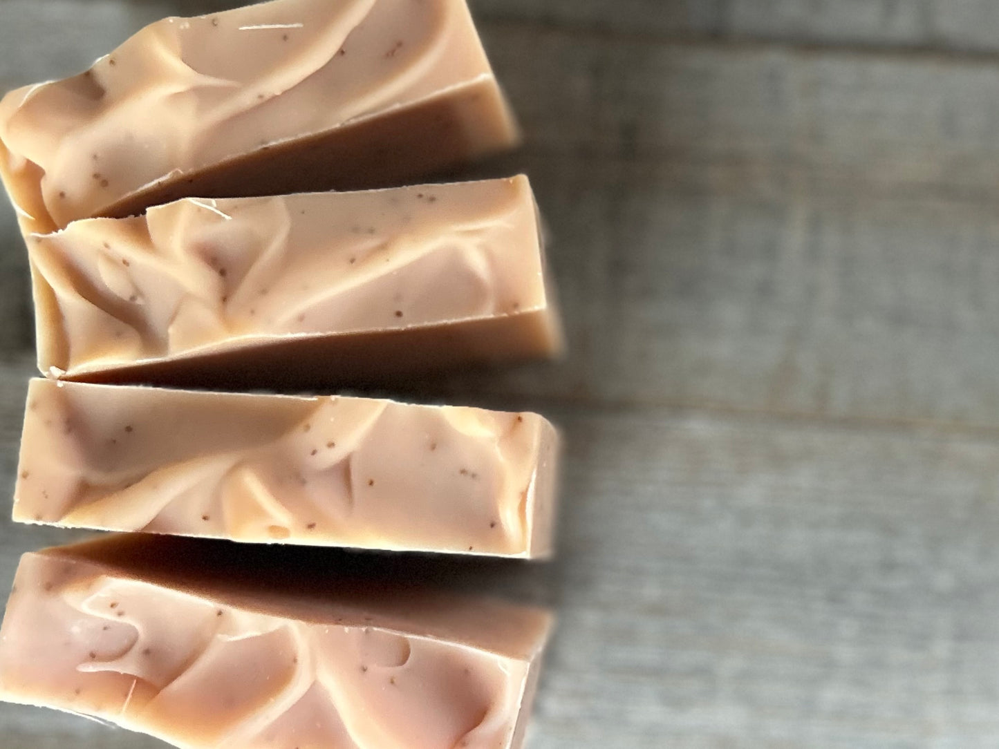 Strawberry Blossom Soap is a sweet citrus blend of neroli and bergamot essential oils. This soap is made with soothing coconut milk, olive oil, coconut oil, cocoa butter, avocado oil and castor oil. Naturally colored with pink clay and strawberry seeds for exfoliation.