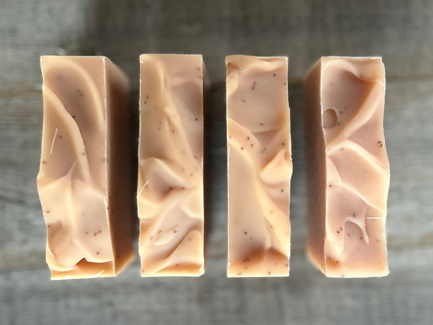 Strawberry Blossom Soap is a sweet citrus blend of neroli and bergamot essential oils. This soap is made with soothing coconut milk, olive oil, coconut oil, cocoa butter, avocado oil and castor oil. Naturally colored with pink clay and strawberry seeds for exfoliation.
