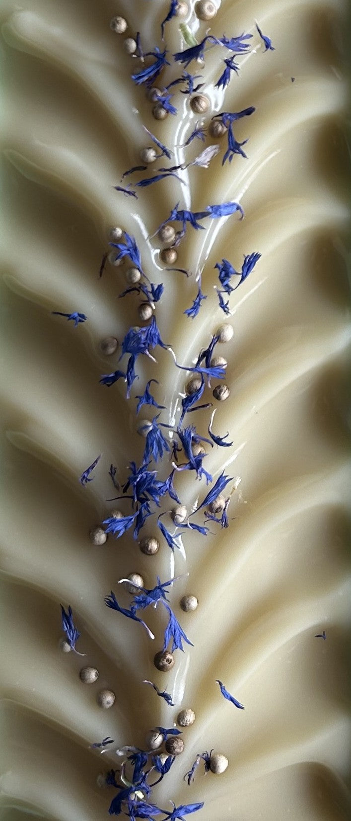 Seaside soap is made with coconut milk, olive oil, coconut oil, cocoa butter, avocado oil and castor oil with a relaxing smell of eucalyptus and spearmint essential oils. It is sprinkled with blue corn flowers and white peppercorns. Naturally colored with white kaolin clay and indigo powder. Kendrick Homestead.