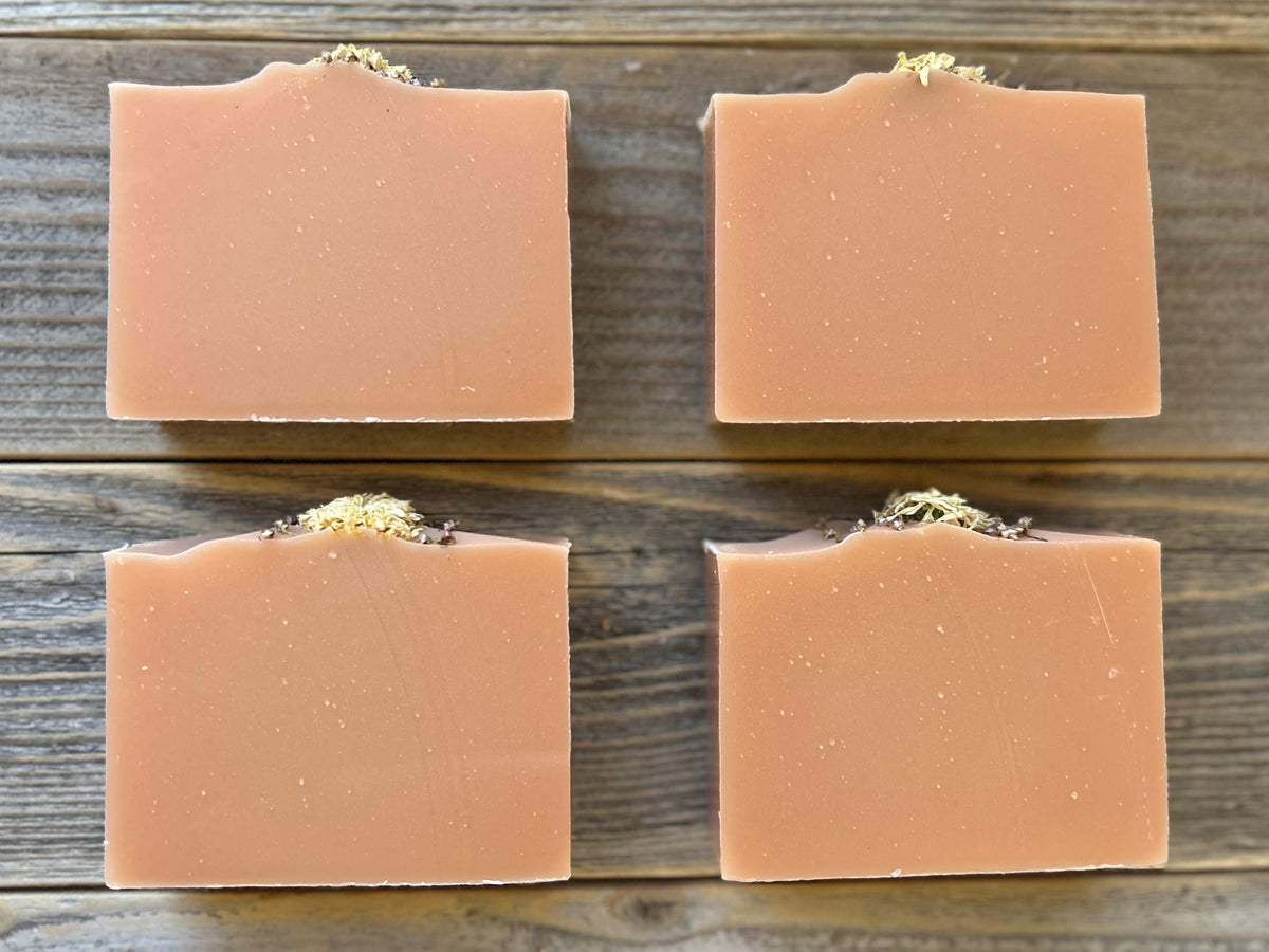 Citrus Blossom Soap is a delicious citrus blend of grapefruit, lemongrass and lime. Made with soothing goat's milk, cocoa butter, creamy shea butter and avocado oil. Naturally colored with rose clay and topped with a variety of dried flowers. Kendrick Homestead