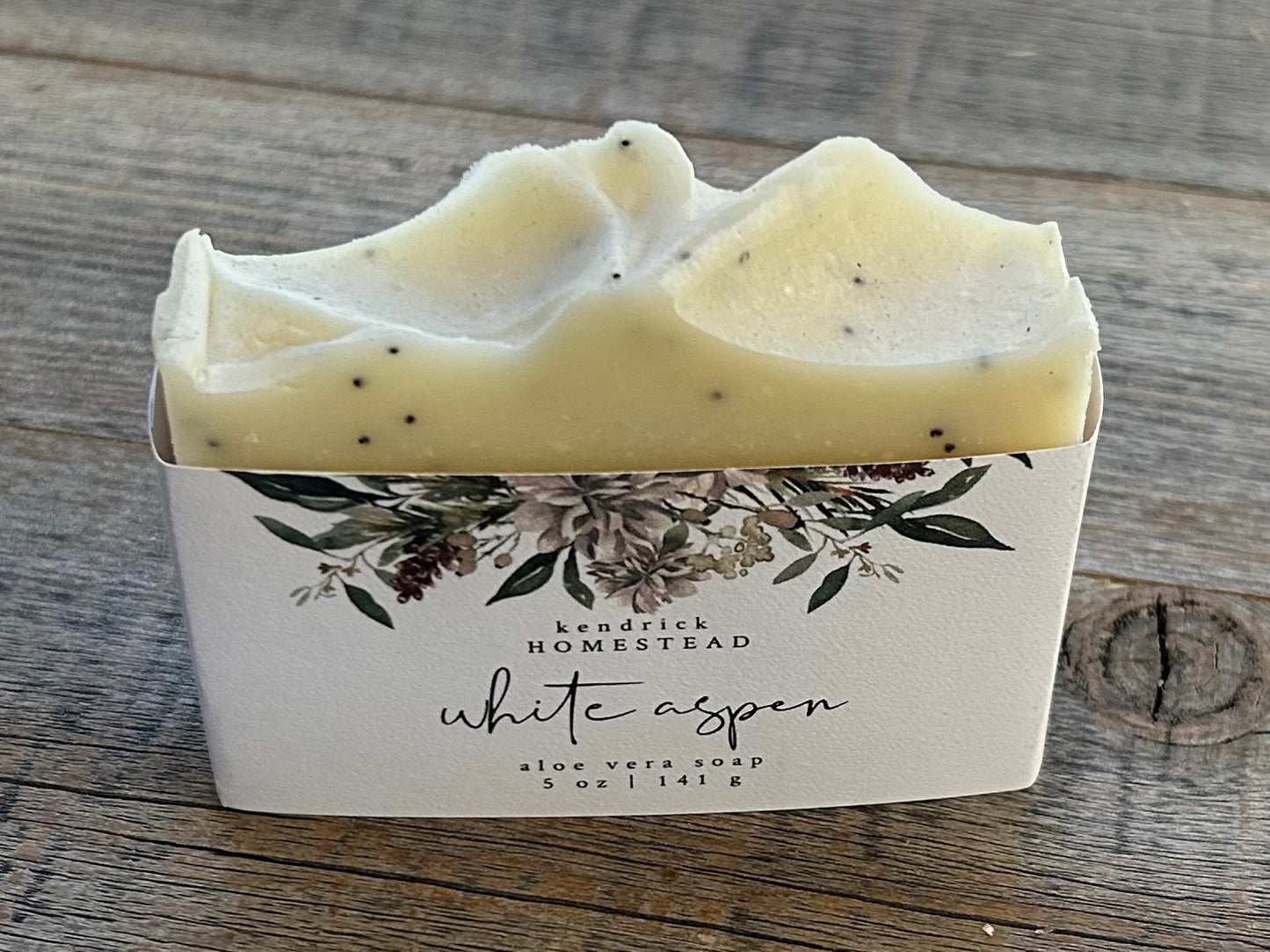 A calming blend of lavender, rosemary and cedar wood, White Aspen soap is our strongest exfoliating soap with ground pumice and poppy seeds. This it great for scrubbing dirt off your hands (and a favorite for men).  White Aspen is made with aloe vera juice, cocoa butter, sweet almond oil and creamy shea butter. The kaolin clay absorbs excess oil, gently cleanses and soothes irritated skin.  Kendrick Homestead