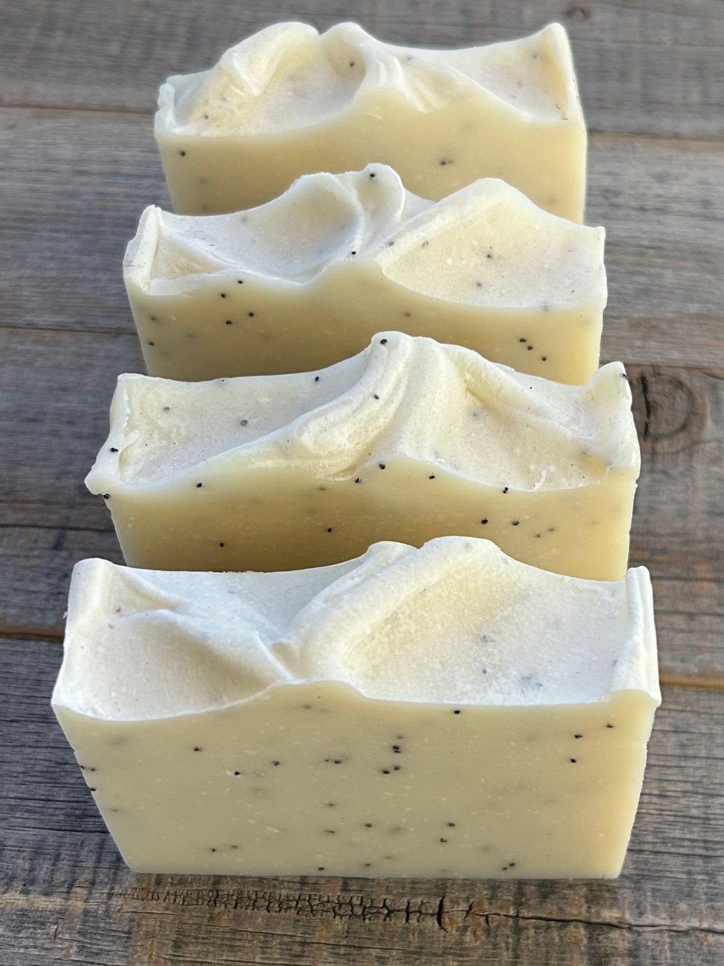 A calming blend of lavender, rosemary and cedar wood, White Aspen soap is our strongest exfoliating soap with ground pumice and poppy seeds. This it great for scrubbing dirt off your hands (and a favorite for men).  White Aspen is made with aloe vera juice, cocoa butter, sweet almond oil and creamy shea butter. The kaolin clay absorbs excess oil, gently cleanses and soothes irritated skin.  Kendrick Homestead