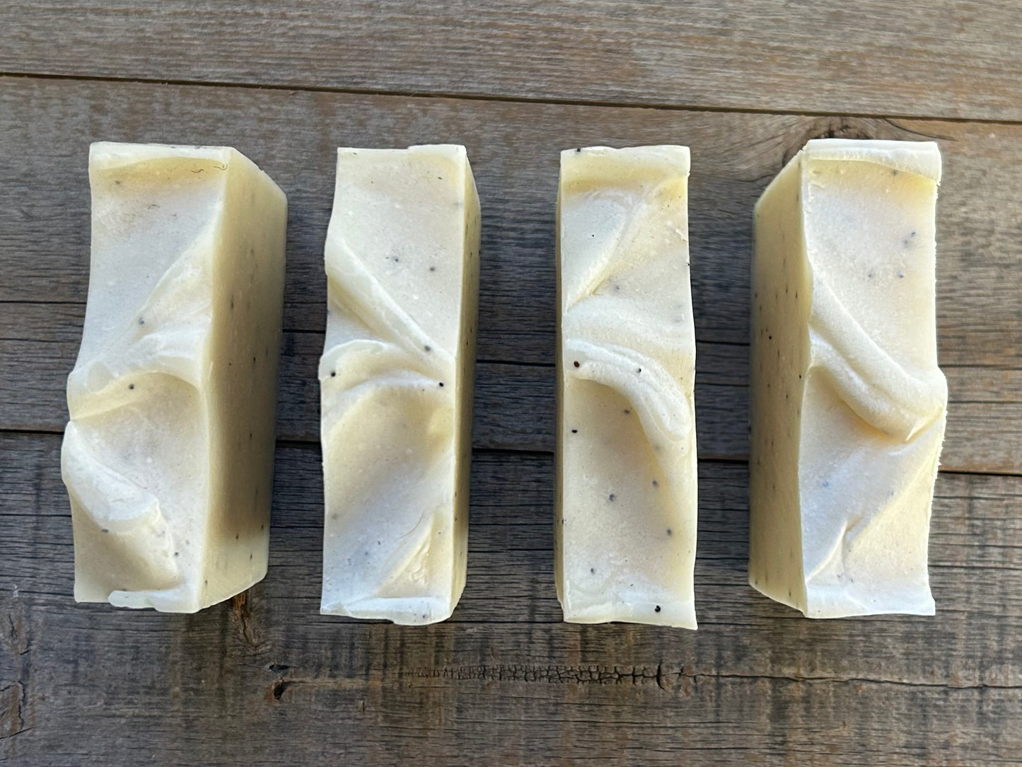 A calming blend of lavender, rosemary and cedar wood, White Aspen soap is our strongest exfoliating soap with ground pumice and poppy seeds. This it great for scrubbing dirt off your hands (and a favorite for men).  White Aspen is made with aloe vera juice, cocoa butter, sweet almond oil and creamy shea butter. The kaolin clay absorbs excess oil, gently cleanses and soothes irritated skin.  Kendrick Homestead