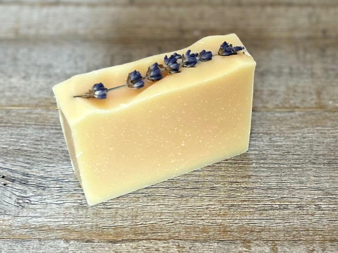 Lemon Lavender Goat's Milk soap, lemon , litsea cubeba and lavender essential oil, topped with a lavender sprig, kaolin clay, Kendrick Homestead