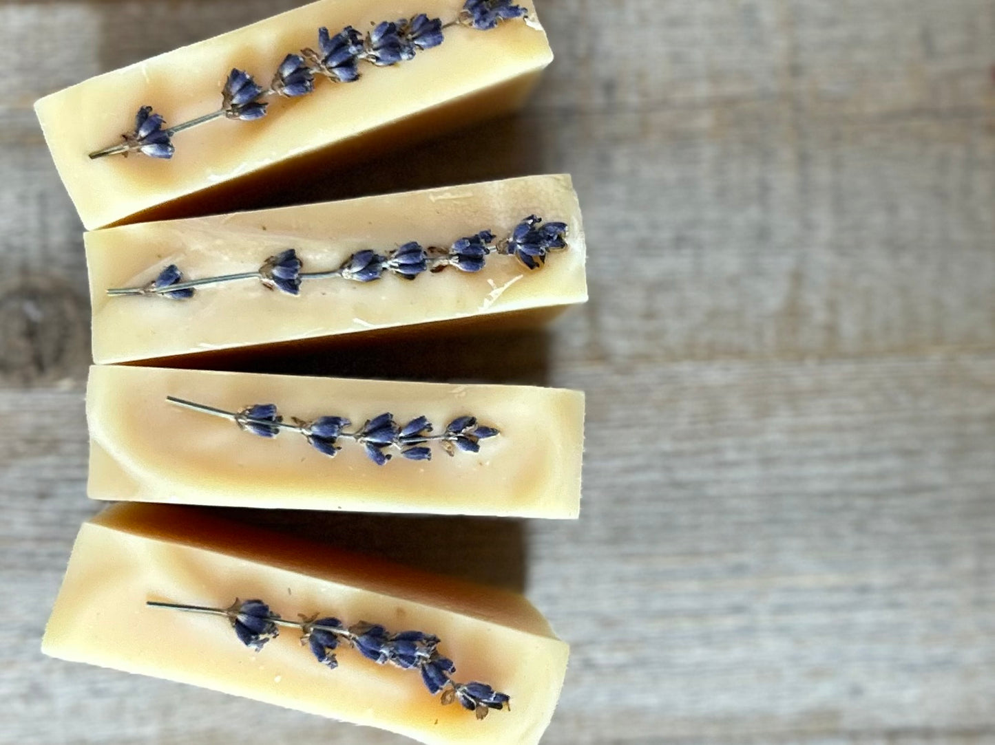 Lemon Lavender Goat's Milk soap, lemon , litsea cubeba and lavender essential oil, topped with a lavender sprig, kaolin clay, Kendrick Homestead