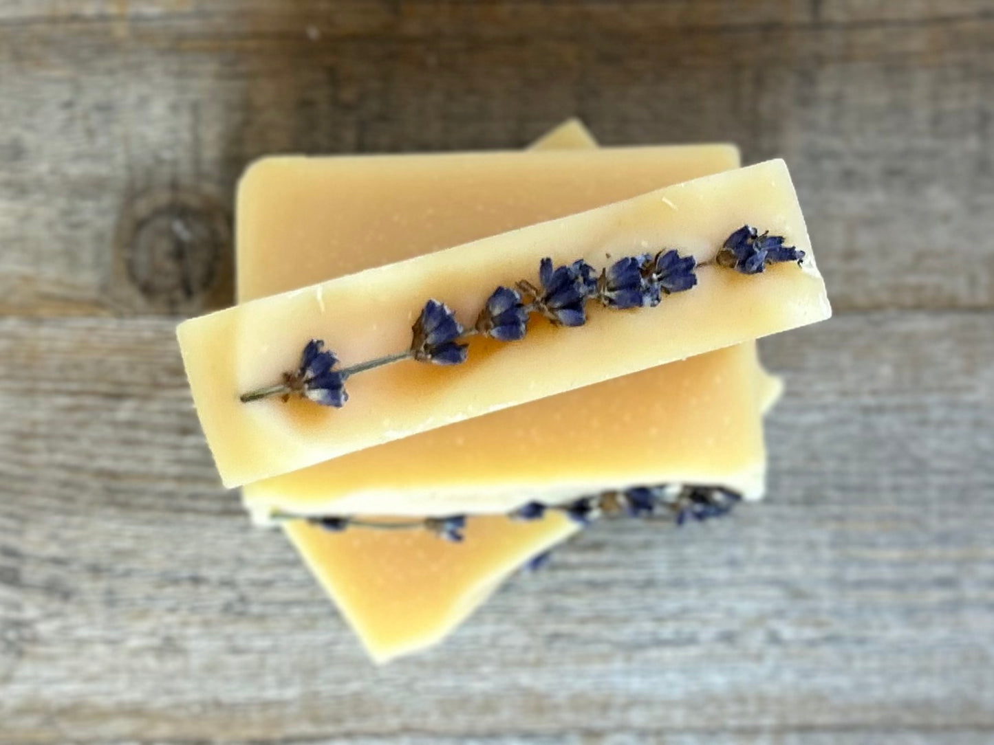 Lemon Lavender Goat's Milk soap, lemon , litsea cubeba and lavender essential oil, topped with a lavender sprig, kaolin clay, Kendrick Homestead