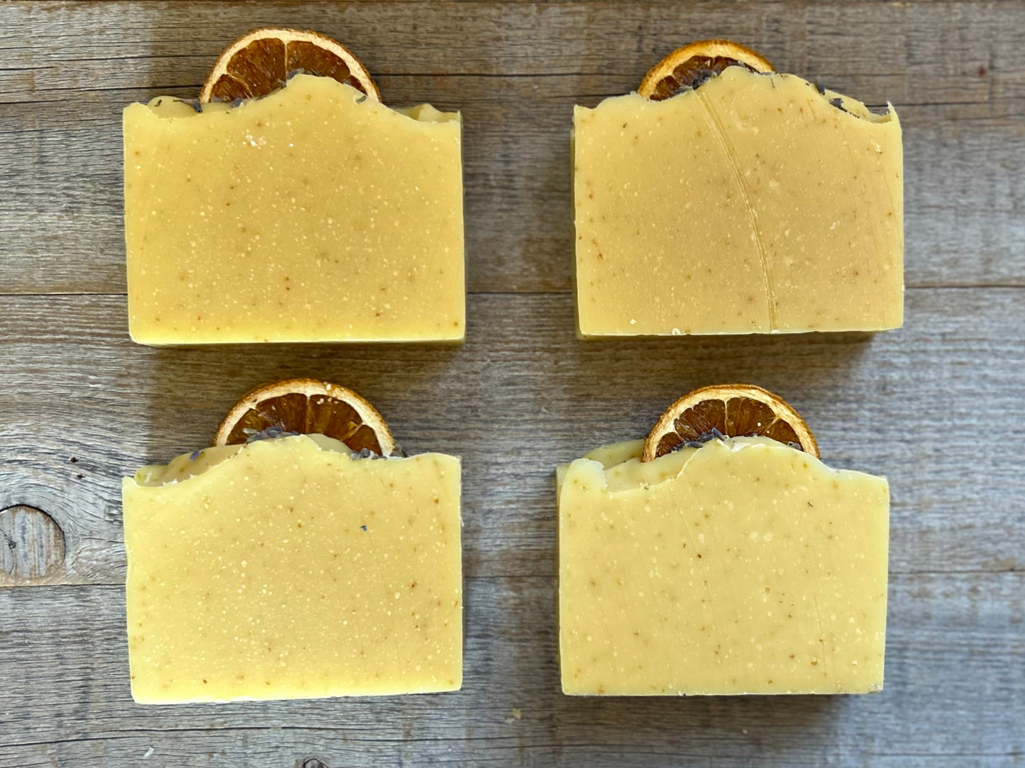 Jump start your morning routine with the invigorating smell of Orange Lavender soap. Made with nourishing goat's milk, cocoa butter, shea butter, avocado oil, kaolin clay and orange peel to lightly exfoliate, refresh and soften the skin.  Kendrick Homestead