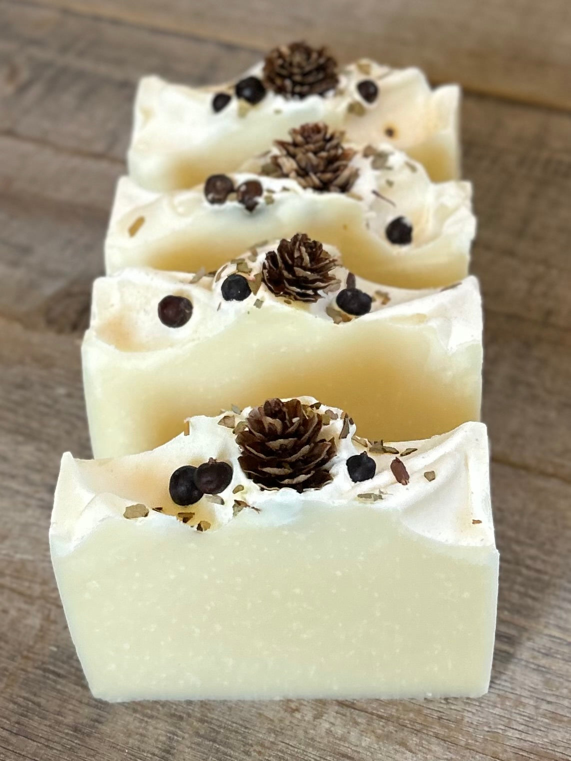 Made with a blend of peppermint, lavender and juniper berry essential oil to promote a sense of balance and calm. Snowy Pine soap is made with soothing aloe vera juice, olive oil, coconut oil, cocoa butter, caster oil and avocado oil. Beautifully decorated to look like a snowy winter, this blend gently cleanses the skin while relieving tension and easing the mind.  Kendrick Homestead