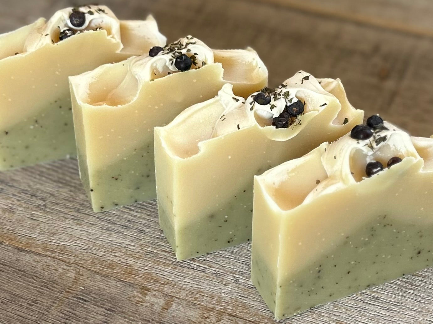 Into The Woods soap is made with a blend of peppermint, spearmint and rosemary essential oil for a refreshing, cooling effect on the skin. This blend will ease your mind and clear your senses. Made with nourishing goat's milk, cocoa butter, avocado oil, kaolin clay, french green clay and ground juniper berries for light exfoliation. Kendrick Homestead