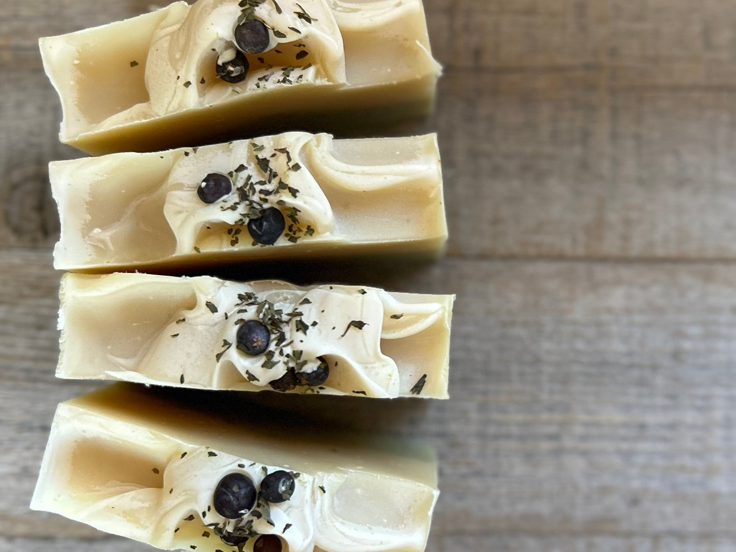 Into The Woods soap is made with a blend of peppermint, spearmint and rosemary essential oil for a refreshing, cooling effect on the skin.&nbsp; One of our personal all time favorite scent blends. This blend will ease your mind and clear your senses. Made with nourishing goat's milk, cocoa butter, avocado oil, kaolin clay, french green clay and ground juniper berries for light exfoliation.