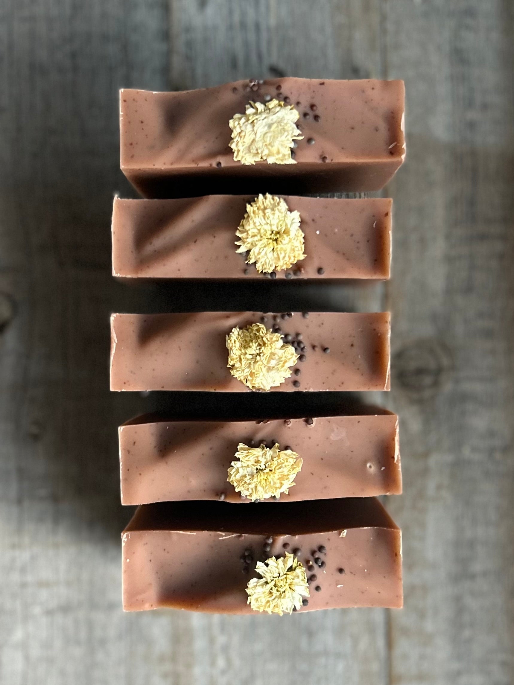 Warm and earthy notes of fall, Cranberry Honey soap is made with nourishing goat's milk, cocoa butter, creamy shea butter, raw honey and freeze dried cranberry powder. With notes of orange and rosemary, this beautiful burgundy floral soap will look stunning in your fall kitchen or bathroom decor. Kendrick Homestead