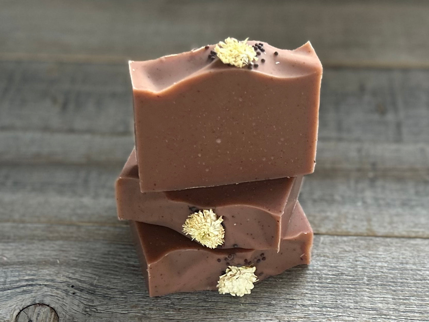 Warm and earthy notes of fall, Cranberry Honey soap is made with nourishing goat's milk, cocoa butter, creamy shea butter, raw honey and freeze dried cranberry powder. With notes of orange and rosemary, this beautiful burgundy floral soap will look stunning in your fall kitchen or bathroom decor. Kendrick Homestead