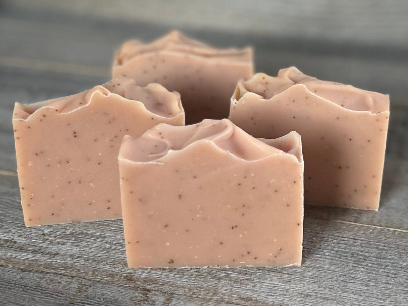 Strawberry Blossom Soap is a sweet citrus blend of neroli and bergamot essential oils. This soap is made with soothing coconut milk, olive oil, coconut oil, cocoa butter, avocado oil and castor oil.&nbsp; Naturally colored with pink clay and strawberry seeds for exfoliation.