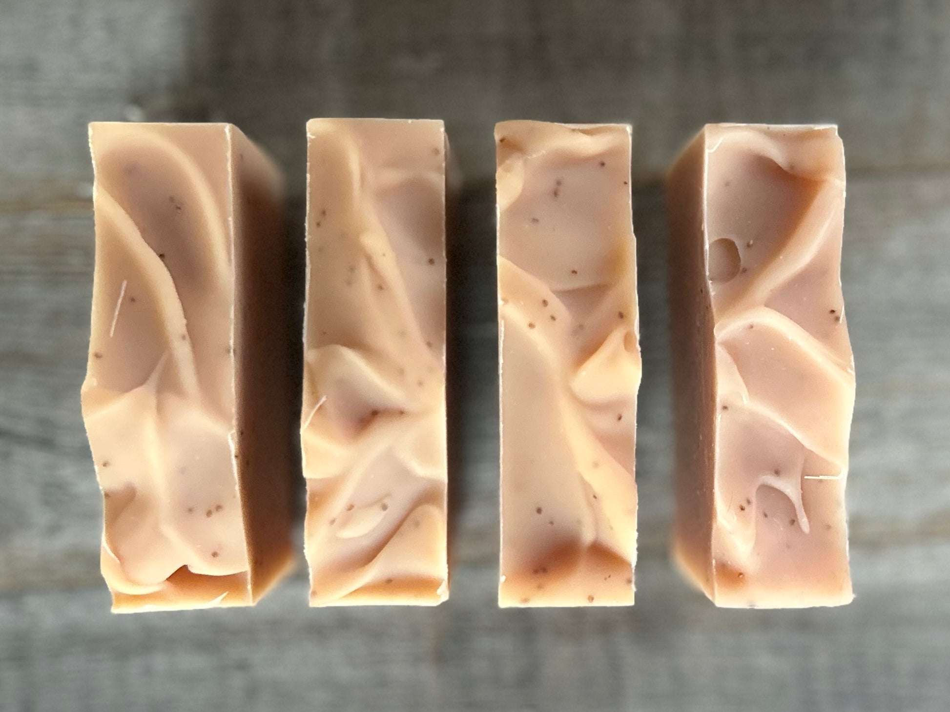 Strawberry Blossom Soap is a sweet citrus blend of neroli and bergamot essential oils. This soap is made with soothing coconut milk, olive oil, coconut oil, cocoa butter, avocado oil and castor oil.&nbsp; Naturally colored with pink clay and strawberry seeds for exfoliation.