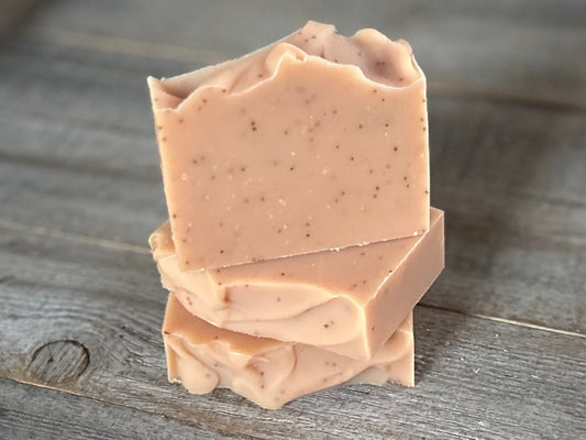Strawberry Blossom Soap is a sweet citrus blend of neroli and bergamot essential oils. This soap is made with soothing coconut milk, olive oil, coconut oil, cocoa butter, avocado oil and castor oil.&nbsp; Naturally colored with pink clay and strawberry seeds for exfoliation.
