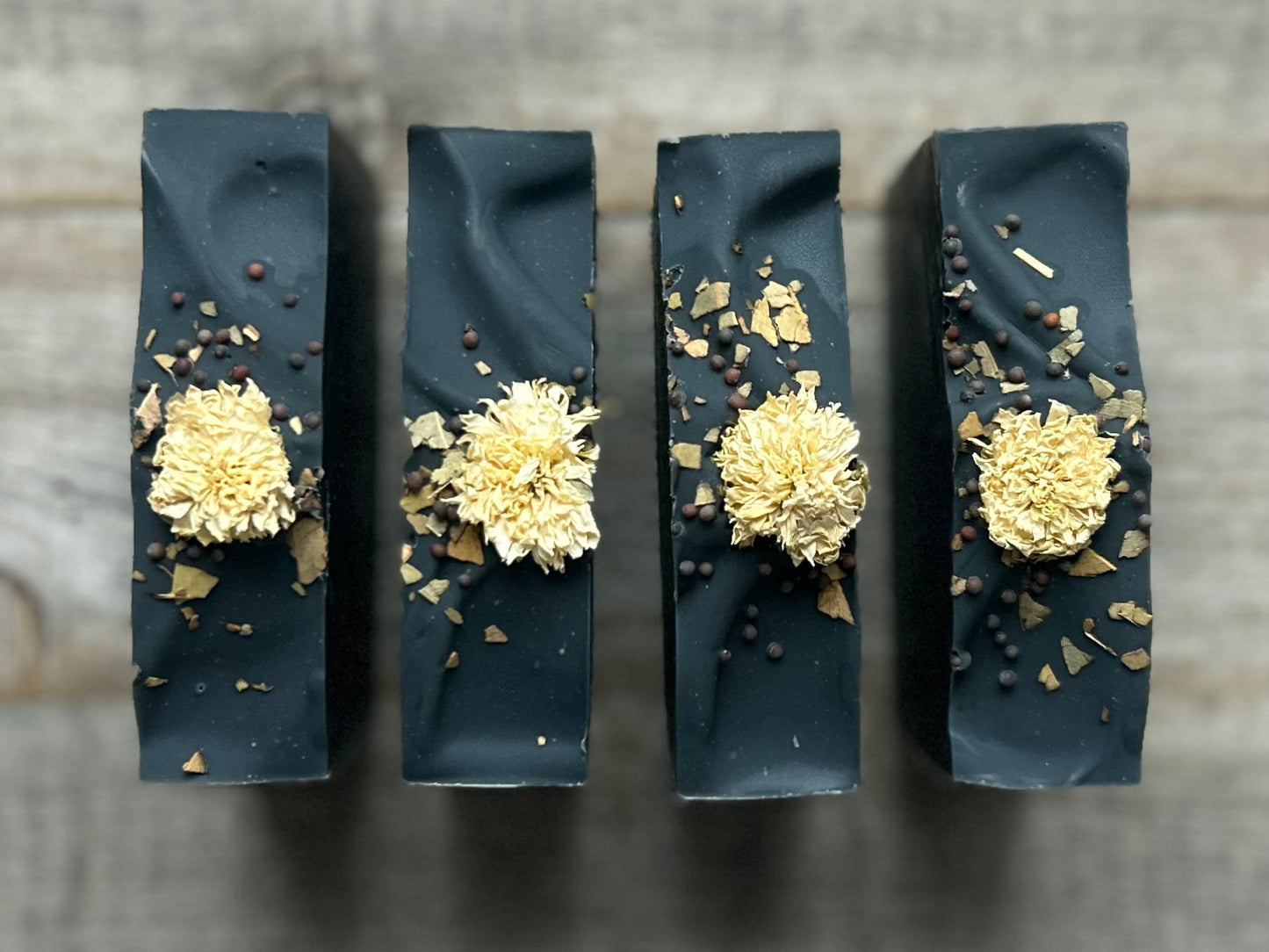 After Dark soap is made with nourishing shea butter, cocoa butter and sweet almond oil. Scented with spearmint, lime and rosemary essential oil and beautifully decorated with a white chrysanthemum, mustard seeds and eucalyptus leaves.

Needless to say, if you want a soap to impress your guests, this is a showstopper.

SCENT:


Naturally scented with spearmint, lime and rosemary essential oil.

Kendrick Homestead