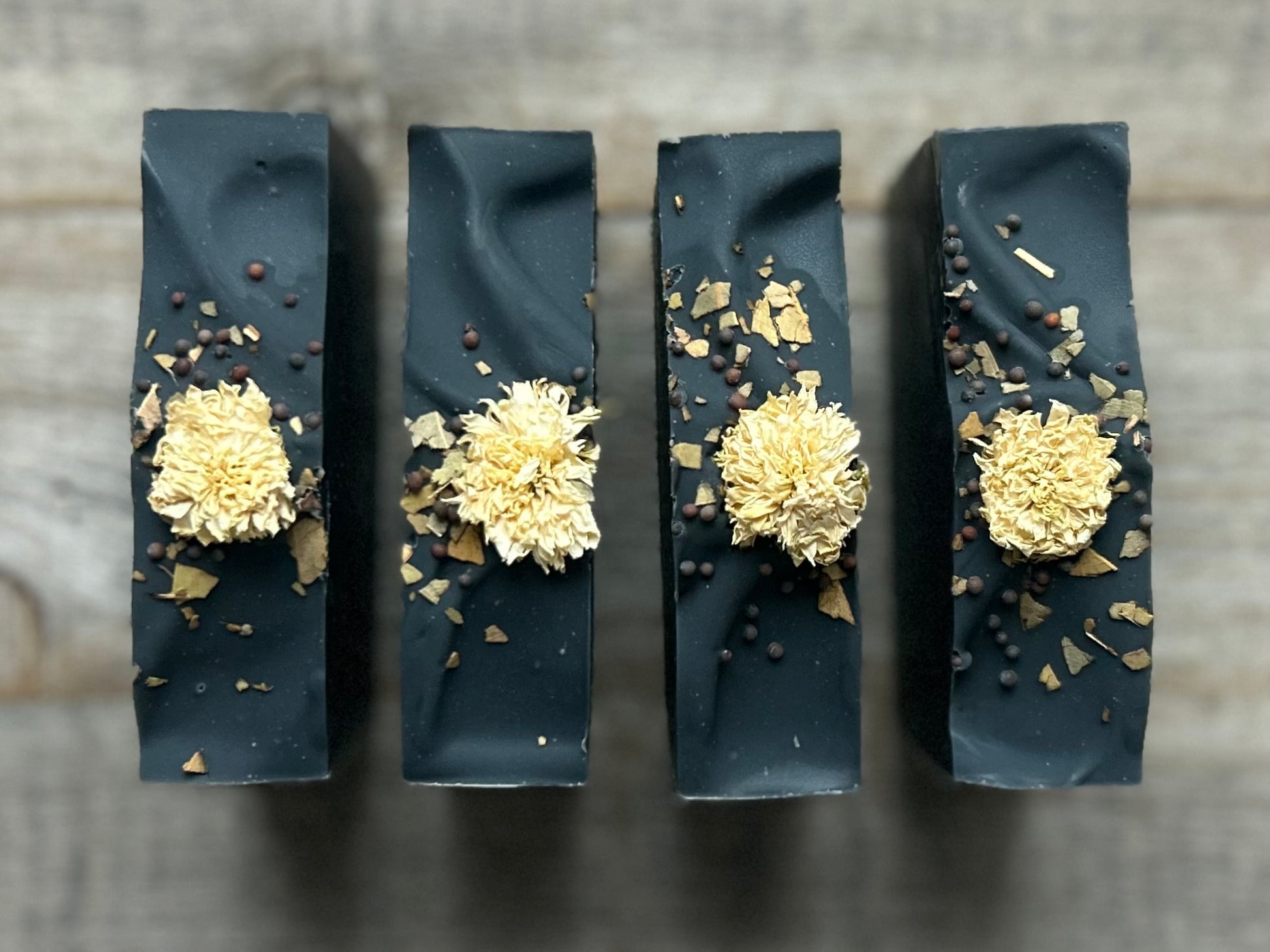 After Dark soap is made with nourishing shea butter, cocoa butter and sweet almond oil. Scented with spearmint, lime and rosemary essential oil and beautifully decorated with a white chrysanthemum, mustard seeds and eucalyptus leaves.

Needless to say, if you want a soap to impress your guests, this is a showstopper.

SCENT:


Naturally scented with spearmint, lime and rosemary essential oil.

Kendrick Homestead