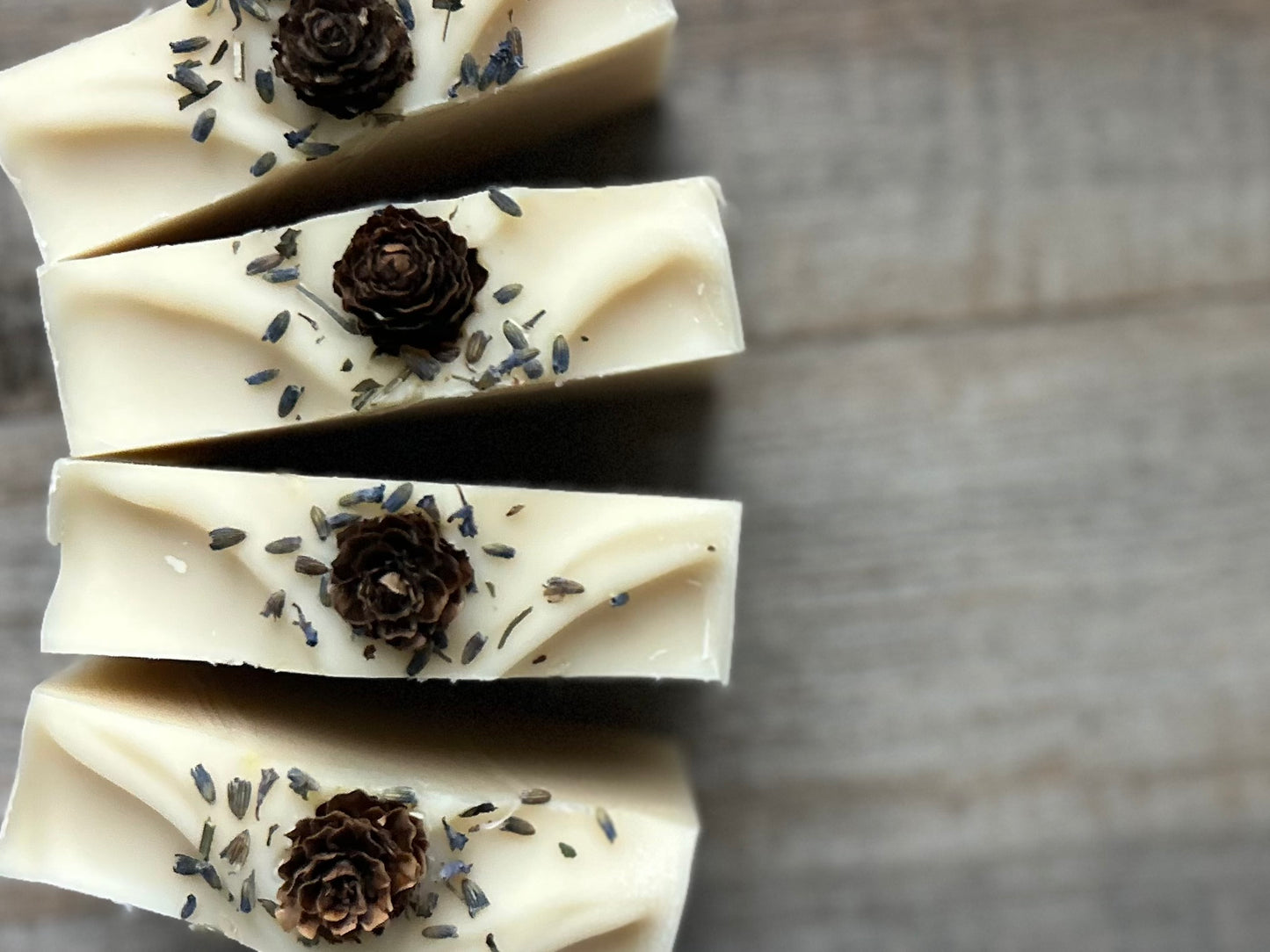 Made with a blend of lavender, peppermint, rosemary and pine needles essential oil to promote a sense of balance and calm. Lavender Pine soap is made with soothing coconut milk, cocoa butter, shea butter, sweet almond oil and caster oil.&nbsp; Beautifully decorated to look like a snowy winter, this blend gently cleanses the skin while relieving tension and easing the mind.

Kendrick Homestead