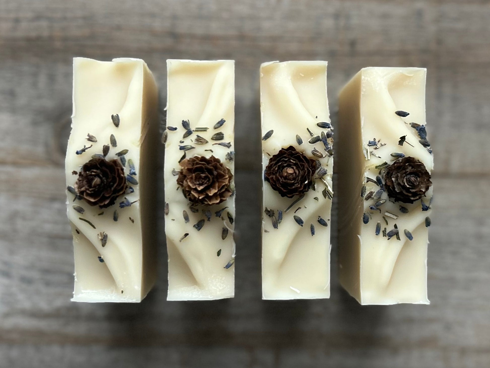 Made with a blend of lavender, peppermint, rosemary and pine needles essential oil to promote a sense of balance and calm. Lavender Pine soap is made with soothing coconut milk, cocoa butter, shea butter, sweet almond oil and caster oil.&nbsp; Beautifully decorated to look like a snowy winter, this blend gently cleanses the skin while relieving tension and easing the mind.

Kendrick Homestead