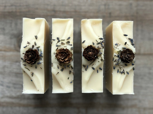 Made with a blend of lavender, peppermint, rosemary and pine needles essential oil to promote a sense of balance and calm. Lavender Pine soap is made with soothing coconut milk, cocoa butter, shea butter, sweet almond oil and caster oil.&nbsp; Beautifully decorated to look like a snowy winter, this blend gently cleanses the skin while relieving tension and easing the mind.

Kendrick Homestead