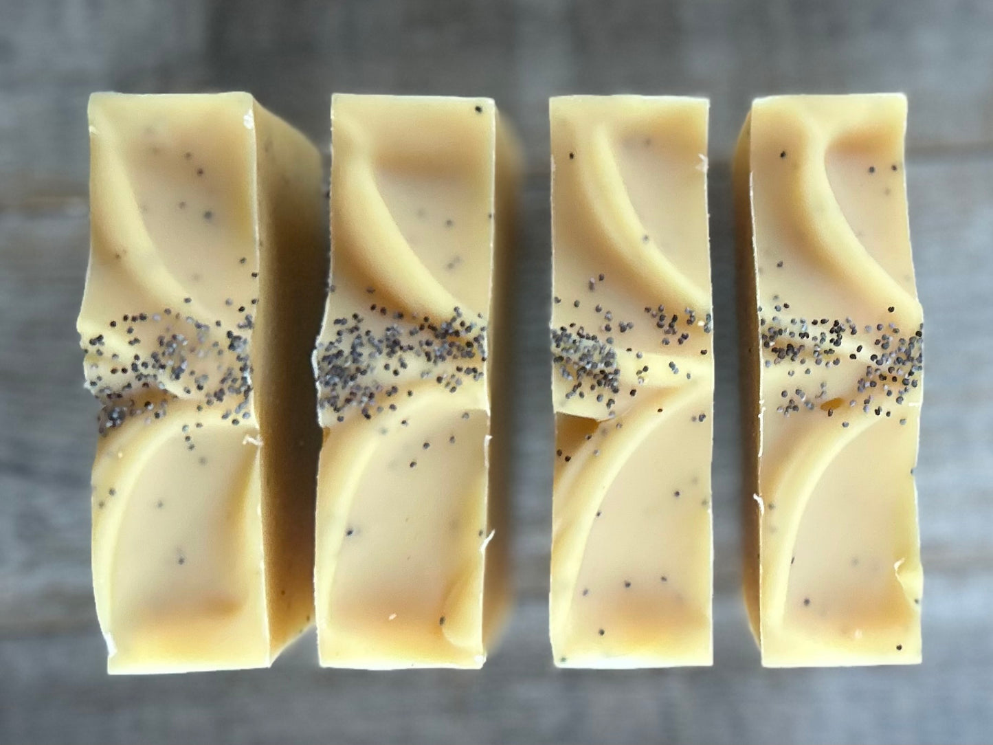 Lemon Poppyseed soap. This is one of my best sellers! Perfect for in your kitchen or take the most refreshing morning shower with this soap! Lemon Poppy Seed soap is made with nourishing goat's milk, olive oil, cocoa butter, shea butter, sweet almond oil and castor oil. It has the vibrant smell of lemon and lemongrass essential oil. Yellow brazilian clay and poppy seeds are added for light exfoliation.  Kendrick Homestead
