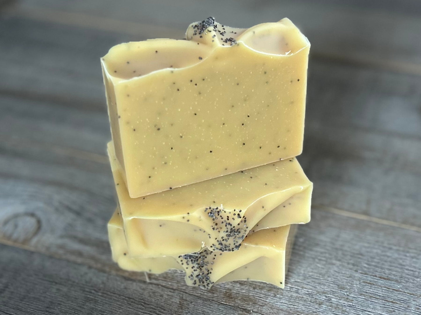 Lemon Poppyseed soap. This is one of my best sellers! Perfect for in your kitchen or take the most refreshing morning shower with this soap! Lemon Poppy Seed soap is made with nourishing goat's milk, olive oil, cocoa butter, shea butter, sweet almond oil and castor oil. It has the vibrant smell of lemon and lemongrass essential oil. Yellow brazilian clay and poppy seeds are added for light exfoliation.  Kendrick Homestead