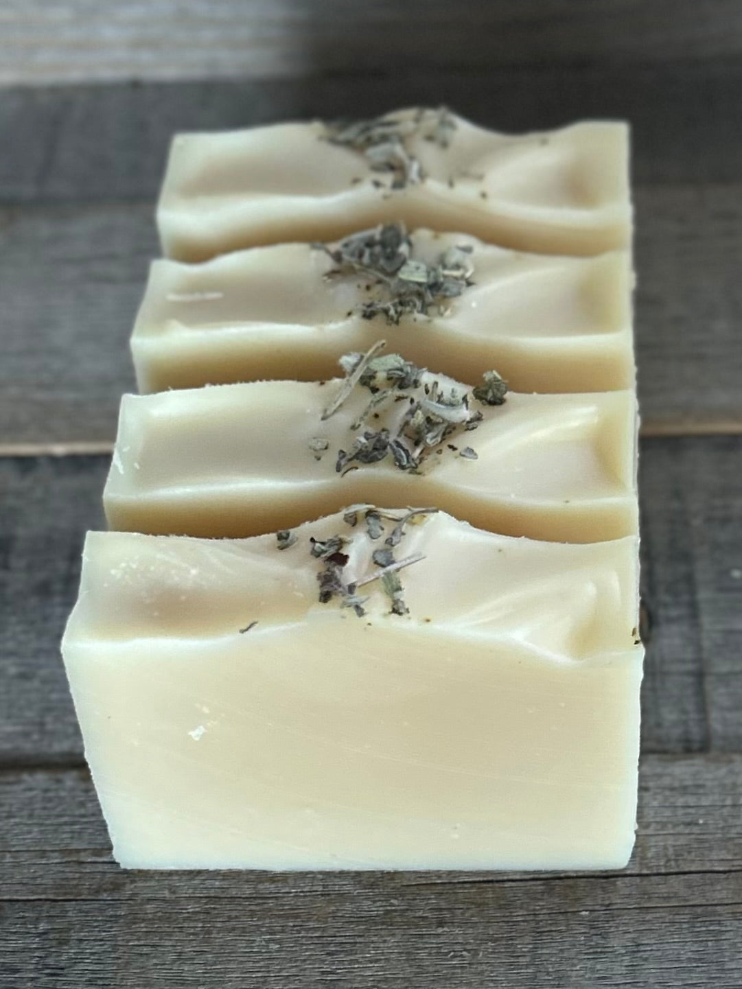 Lavender and White Sage Soap. Let the worries of the day slide away with the help of this relaxing herbal blend of white sage, lavender and cedarwood. Lavender &  White Sage soap is made with nourishing goat's milk, olive oil, coconut oil, cocoa butter, shea butter, sweet almond oil, castor oil, kaolin clay and dried white sage.  Kendrick Homestead