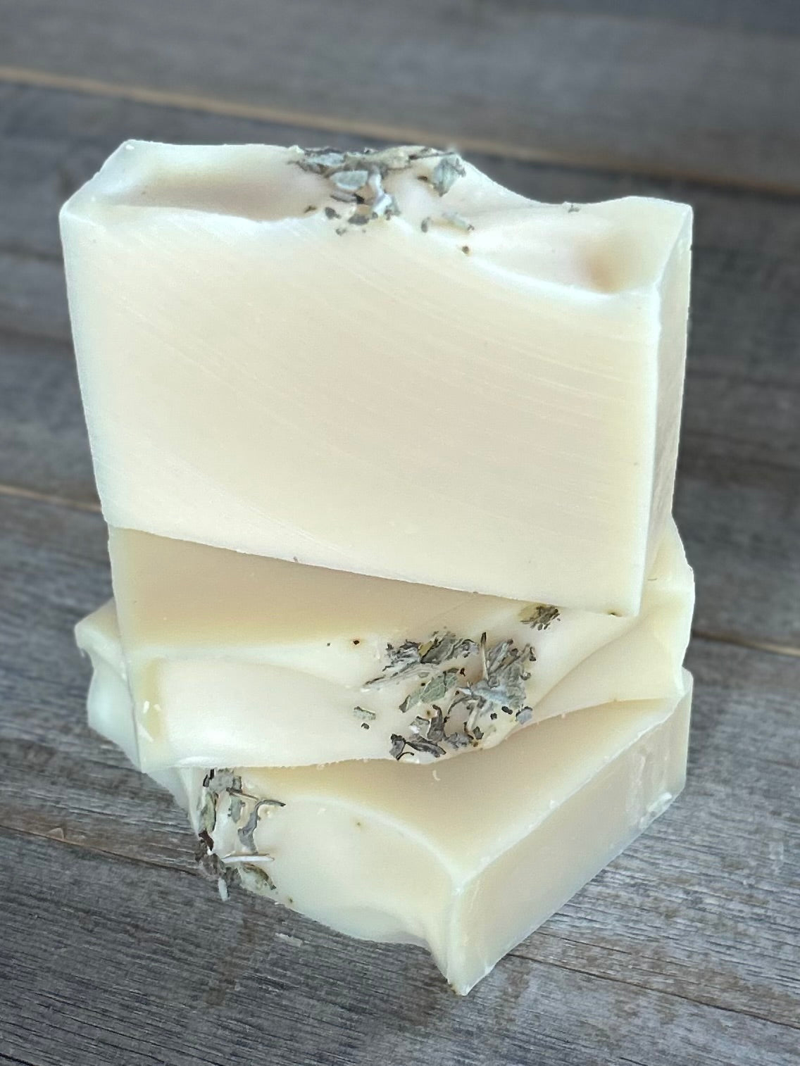 Lavender and White Sage Soap. Let the worries of the day slide away with the help of this relaxing herbal blend of white sage, lavender and cedarwood. Lavender &  White Sage soap is made with nourishing goat's milk, olive oil, coconut oil, cocoa butter, shea butter, sweet almond oil, castor oil, kaolin clay and dried white sage.  Kendrick Homestead