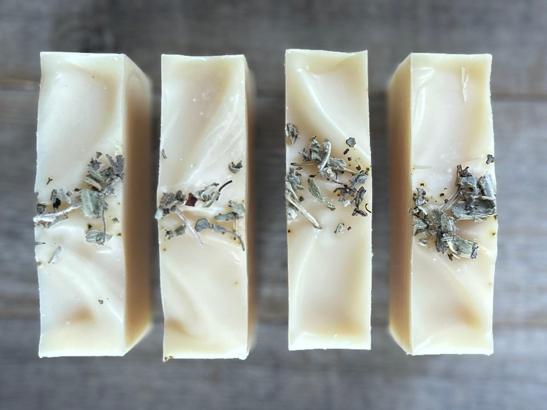 Lavender and White Sage Soap. Let the worries of the day slide away with the help of this relaxing herbal blend of white sage, lavender and cedarwood. Lavender &  White Sage soap is made with nourishing goat's milk, olive oil, coconut oil, cocoa butter, shea butter, sweet almond oil, castor oil, kaolin clay and dried white sage.  Kendrick Homestead