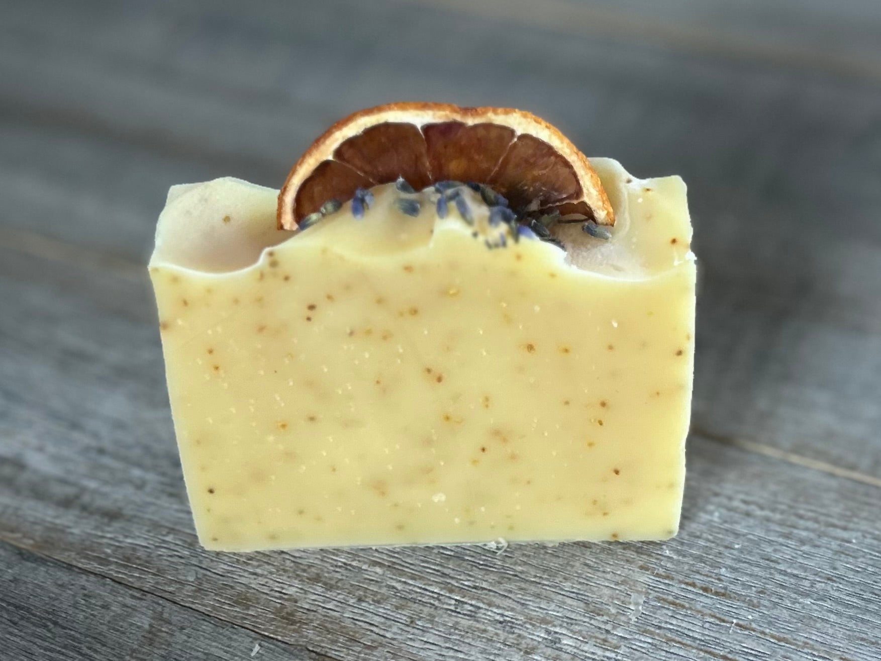 Jump start your morning routine with the invigorating smell of Orange Lavender soap. Made with nourishing goat's milk, cocoa butter, shea butter, avocado oil, kaolin clay and orange peel to lightly exfoliate, refresh and soften the skin.  Kendrick Homestead