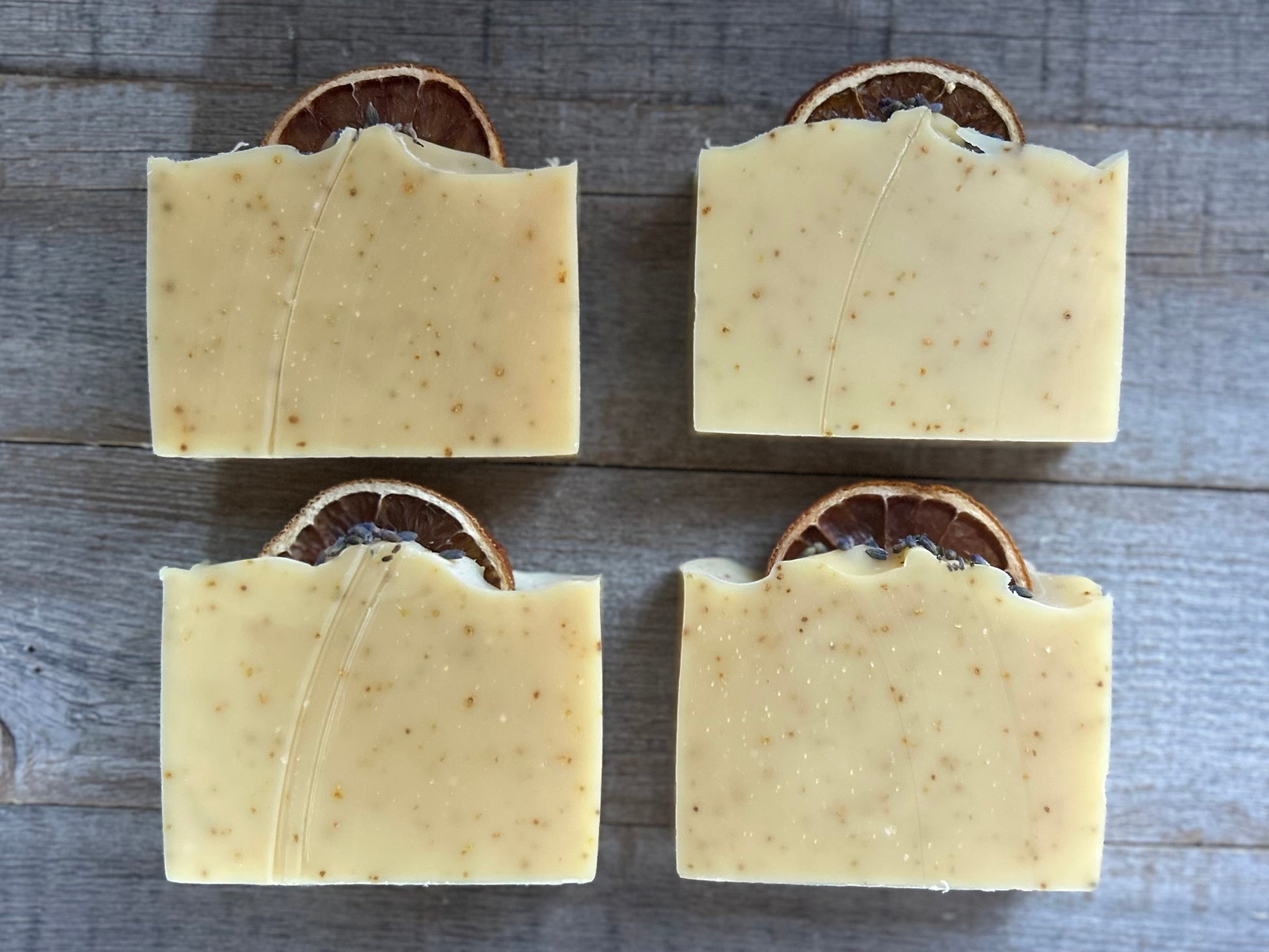 Jump start your morning routine with the invigorating smell of Orange Lavender soap. Made with nourishing goat's milk, cocoa butter, shea butter, avocado oil, kaolin clay and orange peel to lightly exfoliate, refresh and soften the skin.  Kendrick Homestead