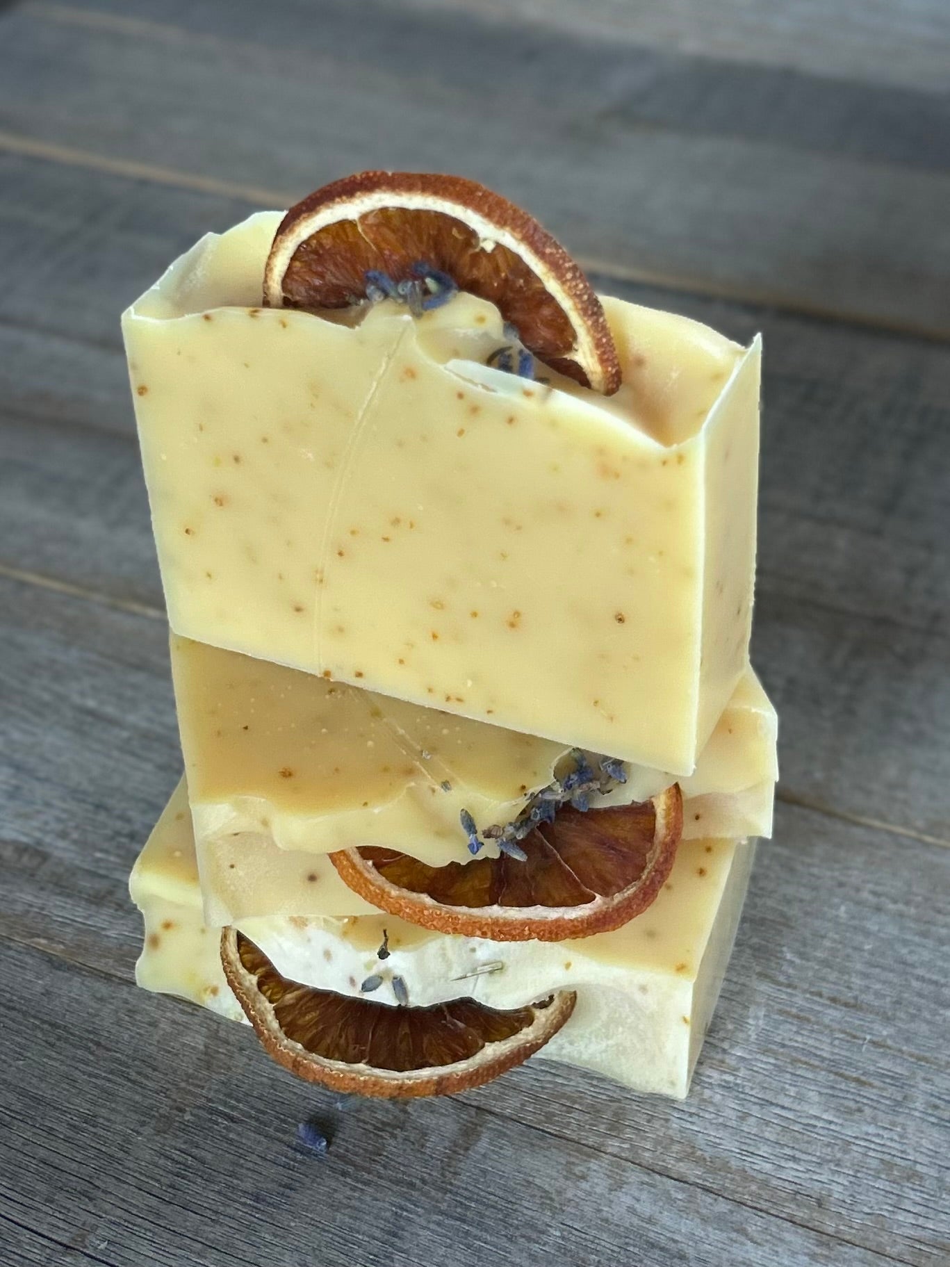 Jump start your morning routine with the invigorating smell of Orange Lavender soap. Made with nourishing goat's milk, cocoa butter, shea butter, avocado oil, kaolin clay and orange peel to lightly exfoliate, refresh and soften the skin.  Kendrick Homestead